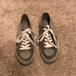 Gray and white Vans